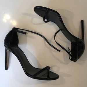 Stuart Weitzman Nudistsong black patent heels